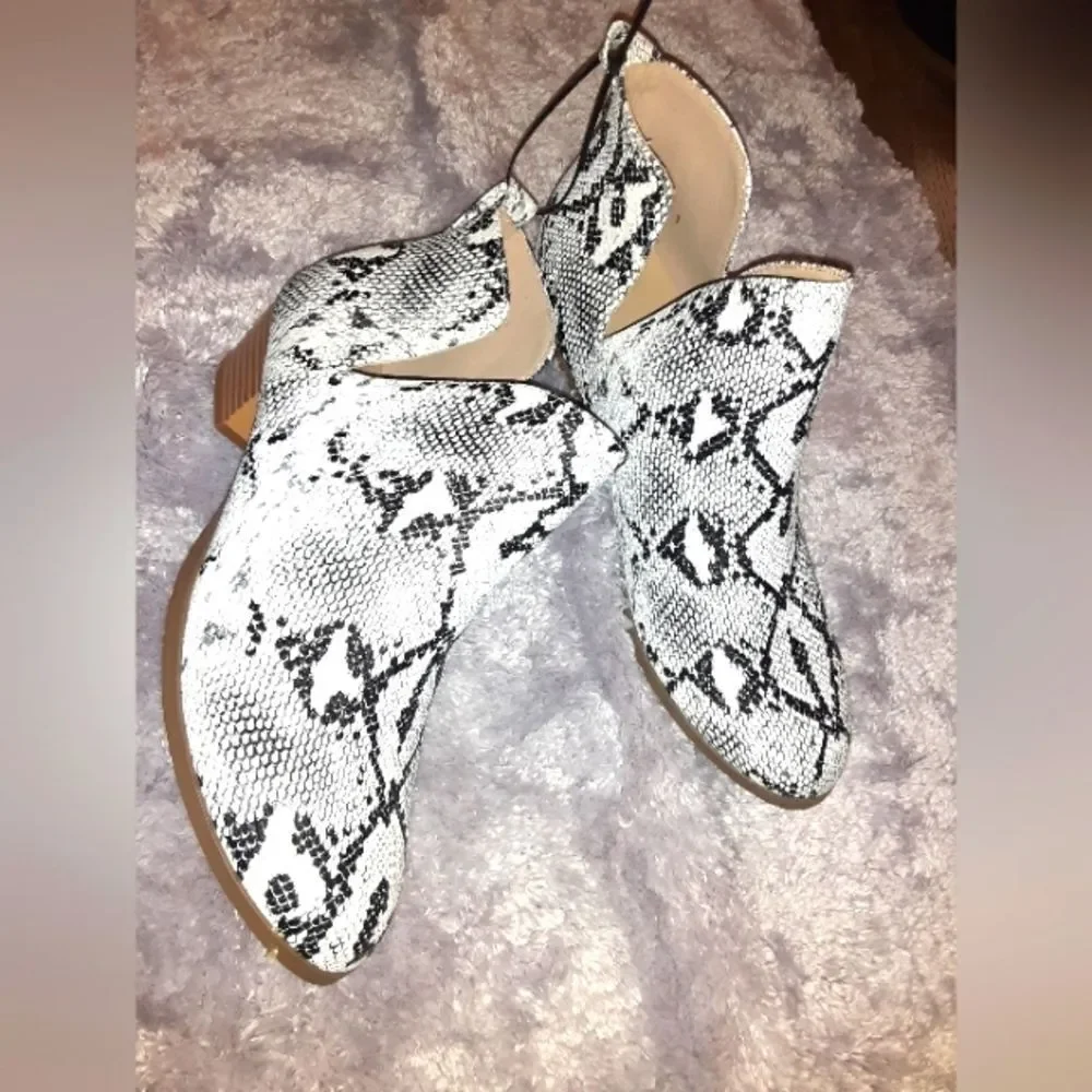 WOMEN'S cut-out ankle boots sz, 8,and 10